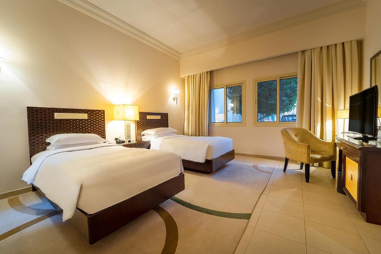 Grand Hyatt Doha Hotel & Villas Kültér fotó A room at the hotel